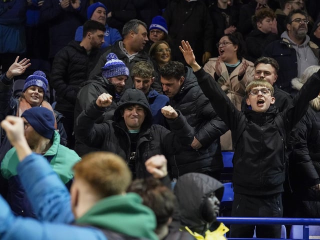 Pompey fans backed their team to a crucial Championship survival win over Cardiff last night.