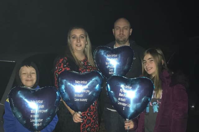 George, Natalie, Shane and Lily Dormer from Portsea releasing ballons in memory of Arthur who was born stillborn on October 22, 2021