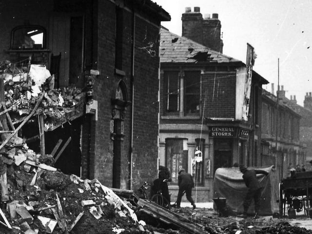 The scene in New Road East, Copnor, Portsmouth, after an air raid in October 1940