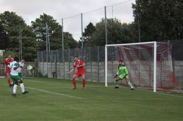 Jason Parish (third left) is poised to score for Bognor during their 3-0 friendly win at Horndean on Friday. Pic: Martin Denyer.