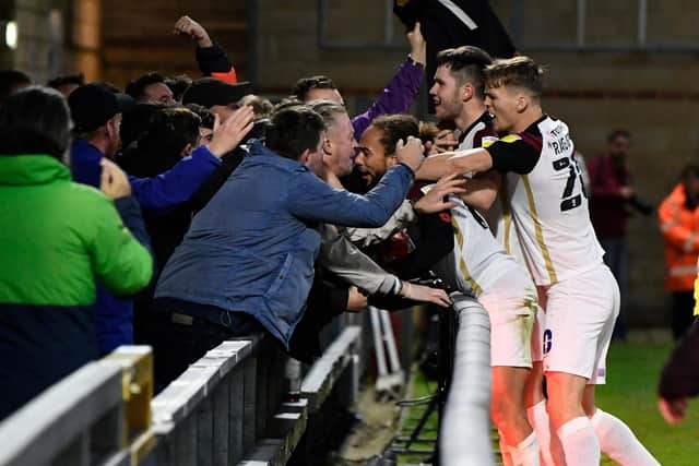Marcus Harness enjoyed his winner at Wycombe with members of the travelling Fratton faithful Picture: Graham Hunt