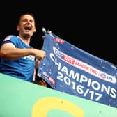 Gareth Evans and Michael Doyle celebrate Pompey taking the League Two title - and outcome Evans felt sparked long-held animosity from Derek Adams. Picture: Harry Murphy/Getty Images