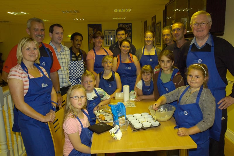 Clavering Primary School pupil Hannah Horsley, front right, puts her cake mixture into their holders as fellow members of a Healthy Living Course look on in 2009.