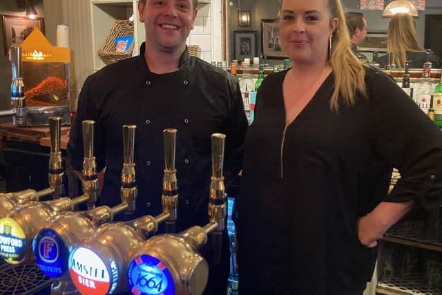 Josh Andrews and pub manager Maria Arnett