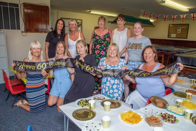 St Nicholas Preschool is celebrating 60 years of providing childcare for the community of Portsmouth this yearon Wednesday 20th July 2022Pictured: Carers and the pupils celebrating at St Nicholas Preschool, North End, PortsmouthPicture: Habibur Rahman