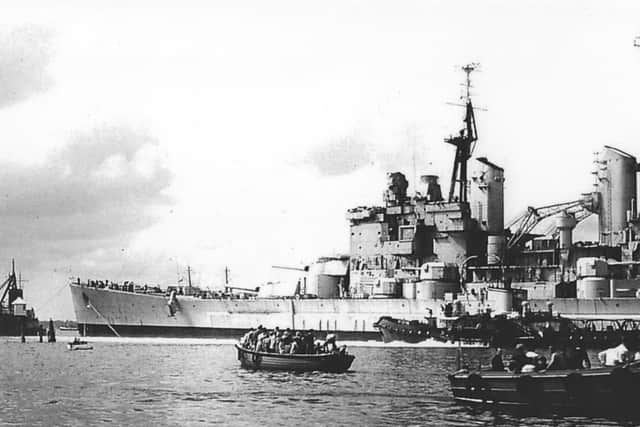 HMS Vanguard surrounded by tugs and sightseers' boats shortly after the photograph from Gosport (above) was taken. Picture: Barry Cox collection