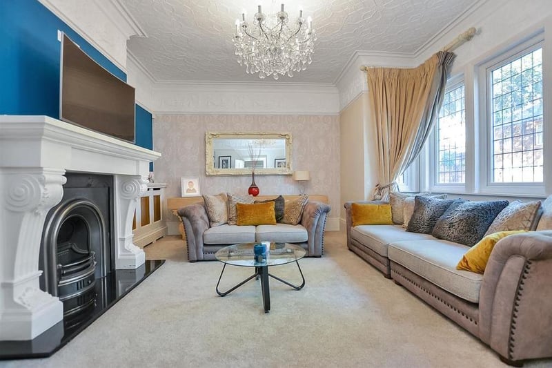 This lovely lounge is a large, bay-fronted reception room, featuring an open fire with period-style surround. A beautiful cornice to the ceiling, deep skirting boards and a large, double-glazed bay window to the front complete the appeal.
