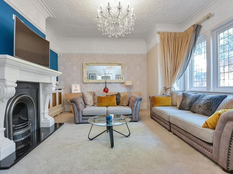 This lovely lounge is a large, bay-fronted reception room, featuring an open fire with period-style surround. A beautiful cornice to the ceiling, deep skirting boards and a large, double-glazed bay window to the front complete the appeal.