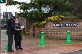 Police, paramedics and coastguard crews at Haslar Marina in Gosport on December 13, 2021. Picture: Alex Shute