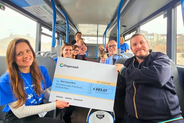James Thomson (Stagecoach South Bus Driver), with Daryl Jowett (Assistant Operations Manager), hand over cheque to West Sussex Mind with support group.
