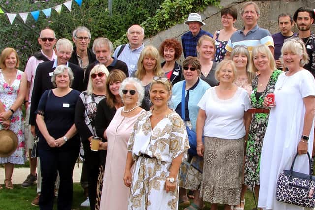 Bill with more of his former staff at the reception in the model village last Saturday. Picture: Bob Hind.