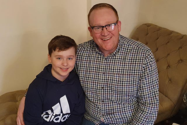 Shane Mason, 35, wanted the perfect HMS Queen Elizabeth aircraft carrier cake for his son Maxwell's eighth birthday party on February 29. But instead he got a 'monstrosity' of a cake. Shane told the baker to take it with her and refund his £60 deposit. Pictured: Shane Mason and his son Maxwell laughing about the cake
