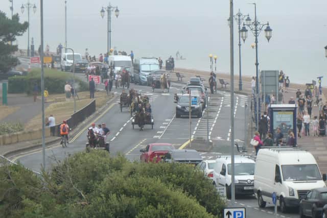 The convoy arrives at the seafront