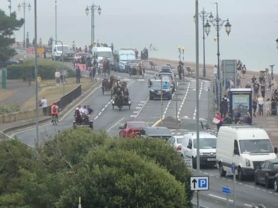 The convoy arrives at the seafront