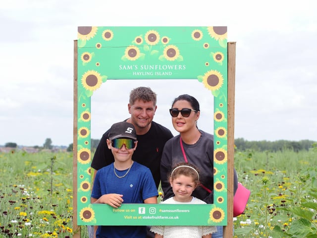 Sam's Sunflowers in Hayling Island, on Sunday, August 4, 2024.
Pictured is: Scott and Amy Elderfield from Farnham with their children Louie (10) and Ruby (6).
Picture: Sarah Standing (040824-3844)