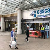 Shops across Commercial Road have had staff guiding customers to queue outside, including the Cascades Shopping Centre. Picture: Richard Lemmer