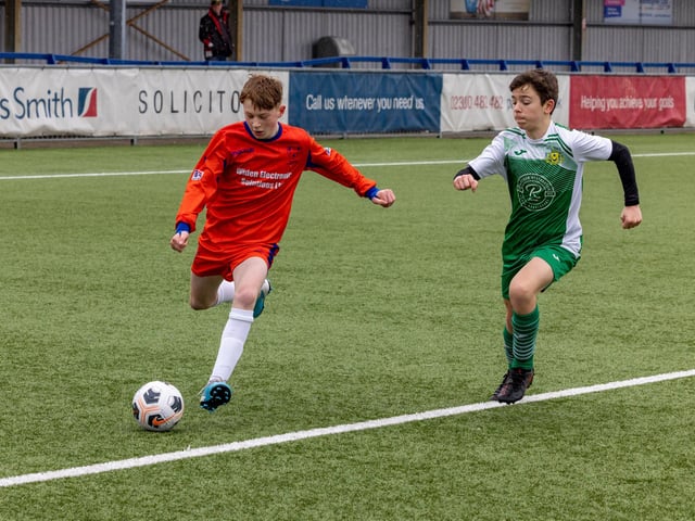 Action from the Under-13 Truman Challenge Cup final between Denmead Youth Lions (orange shirts) and Moneyfields Youth Yellow. Picture: Mike Cooter