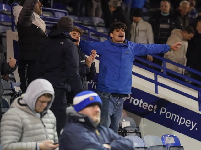 Pompey fans backed their team to a crucial Championship survival win over Cardiff last night.