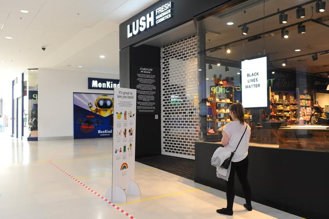 Shoppers visit cosmetics outlet Lush to browse - and smell - its wide selection of soaps and bath bombs.
Picture: Sarah Standing