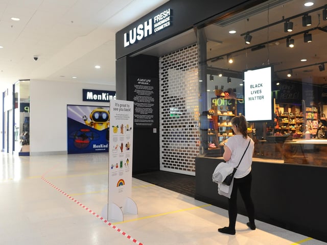 Shoppers visit cosmetics outlet Lush to browse - and smell - its wide selection of soaps and bath bombs.
Picture: Sarah Standing