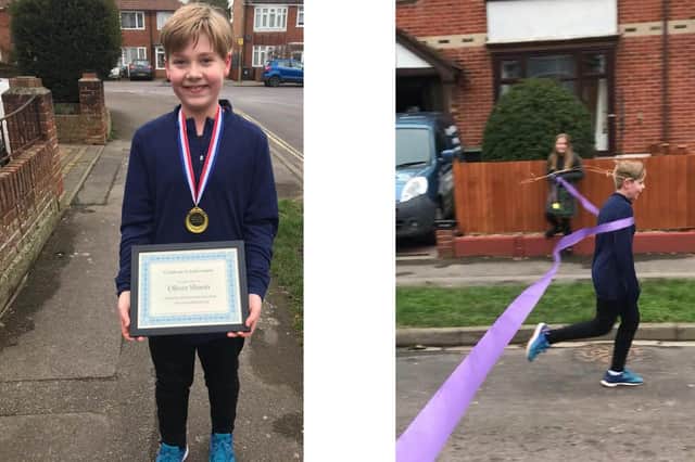 Oliver Shann, 10 from Elson, ran a marathon in January for Cancer Research UK. Pictured: Oliver with his medal and certificate and, right, crossing the finish line