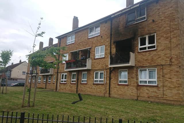 Charred remnants of wood could be seen from the balcony, with smoke discolouring the brickwork.