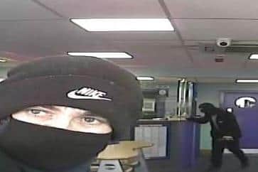 Masked robbers pictured attempted to raid the Coral betting shop in Gosport. Photo: Hampshire police