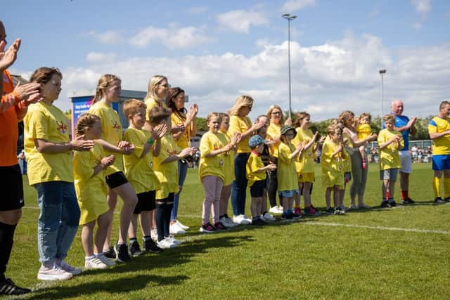 All players from Sophies Allstars and the Pompey Charity Squad observed a minutes applause before kick off to celebrate Sophie Fairall.
Picture: Alex Shute