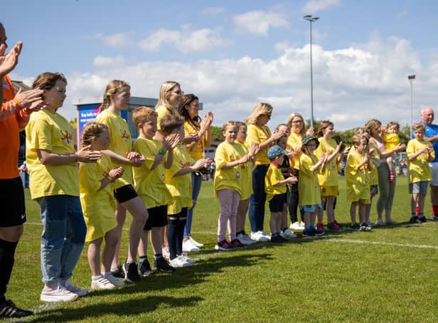 All players from Sophies Allstars and the Pompey Charity Squad observed a minutes applause before kick off to celebrate Sophie Fairall.
Picture: Alex Shute
