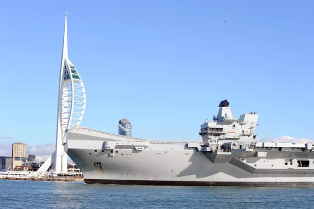 HMS Queen Elizabeth returning in Portsmouth on Thursday, October 13.

Picture: Sarah Standing (131022-1373)