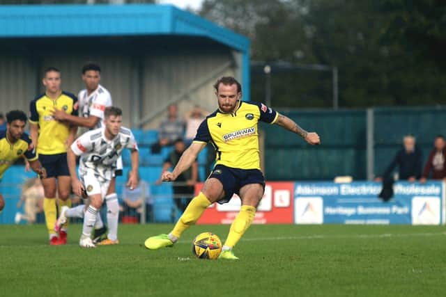 Theo Widdrington about to put Gosport in front against Tiverton. Picture: Tom Phillips