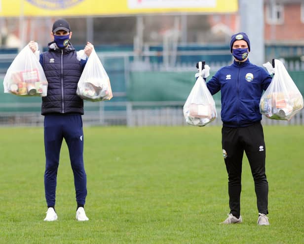Matt Paterson and Pat Suraci with some of the food parcels they have delivered as part of the Gosport Borough 'Feed a Family in Need' scheme which has now been running for 300 days. Picture: Sarah Standing