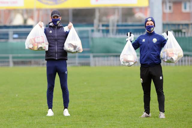 Matt Paterson and Pat Suraci with some of the food parcels they have delivered as part of the Gosport Borough 'Feed a Family in Need' scheme which has now been running for 300 days. Picture: Sarah Standing