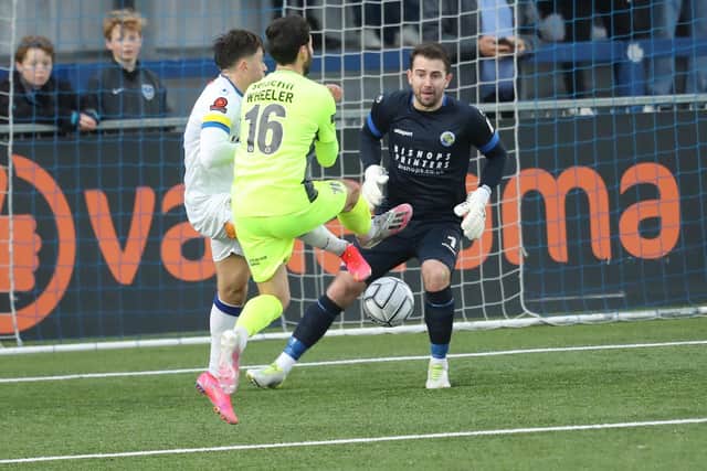 Nick Wheeler opens the scoring for Dorking. Picture: Dave Haines