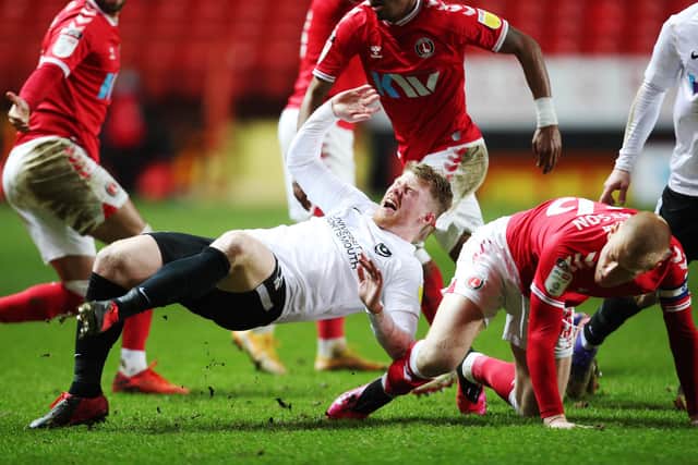 Andy Cannon is fouled during Pompey's 3-1 win at The Valley. Picture: Joe Pepler