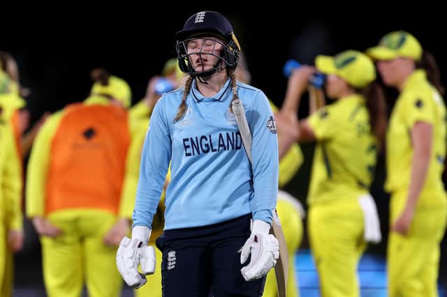 England's Charlie Dean reacts after her dimissal during the 2022 Women's Cricket World Cup final. Photo by Marty MELVILLE / AFP.