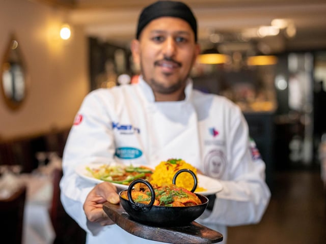 A well-established eatery, multiple readers reccomended the Akash Indian restaurant.  Pictured: Chef Faz Forhad Ahmed with the popular dishes at the Akash. Picture: Habibur Rahman