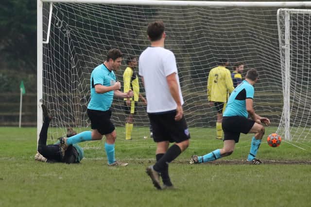 North End Lions (blue/black) celebrate a goal against Seagull Reserves. Picture: Kevin Shipp
