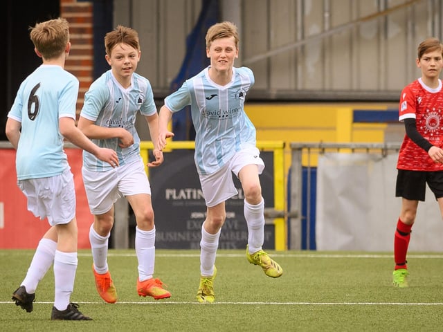 Action from the Portsmouth Youth League Geldard Invitation Cup final between Jubilee 77 U13s and Castle United U13s (light blue and white kit). Picture: Keith Woodland (190321-398)