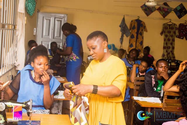 Yemisi in Badagry, Nigeria, in 2019 to support a government iniative which helped women learn new skills.
