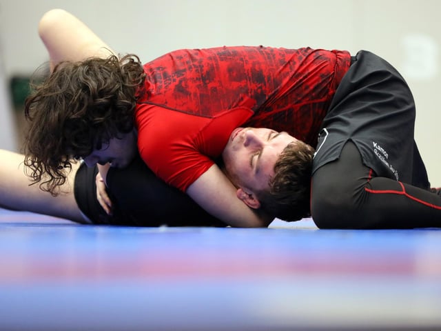 David Ionita (wearing red) competing in a Brazilian Jiu Jitsu competition at the Ravelin Centre in Portsmouth. Picture: Chris Moorhouse (jpns 250223-05)