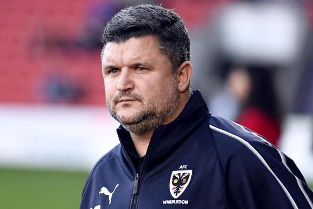Pompey coach Simon Bassey is second favourite to become the new AFC Wimbledon boss.