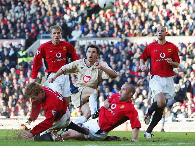 Svetoslav Todorov gets the ball past the United defence during an FA Cup Third Round match at Old Trafford in January 2003. Pompey lost 4-1. Picture: Laurence Griffiths/Getty Images