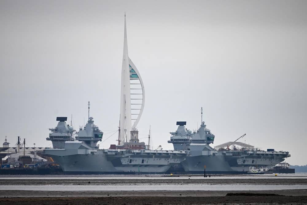 HMS Queen Elizabeth aircraft carrier alongside HMS Prince of Wales, docked in Portsmouth Navy Base, which is to be upgraded. Photo by Finnbarr Webster/Getty Images