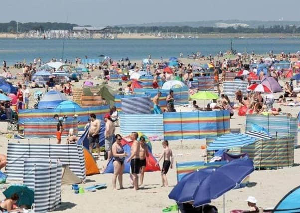 West Wittering is nicknamed “God’s Pocket” by locals for its pastel huts and sloping dunes