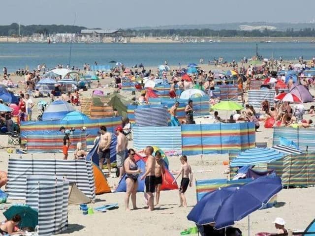 West Wittering is nicknamed “God’s Pocket” by locals for its pastel huts and sloping dunes