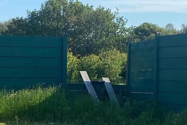 The broken fence at Fareham Town Football Club