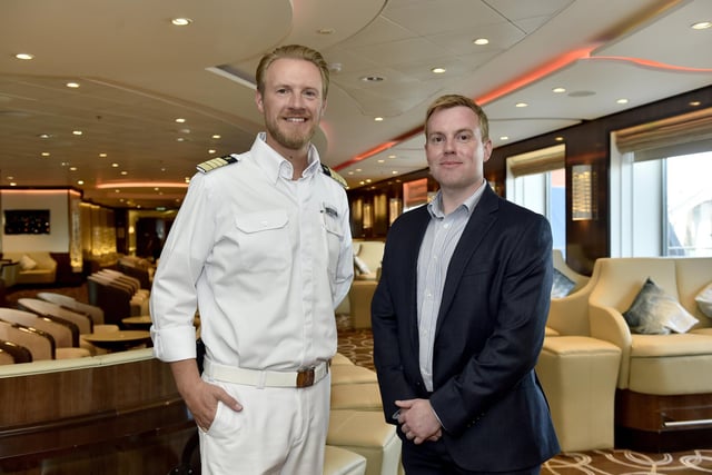 Pictured is: (l-r) Captain of Mein Schiff 3 Simon Böttger and Andrew Williamson, passenger operations manager (Portsmouth International Port).