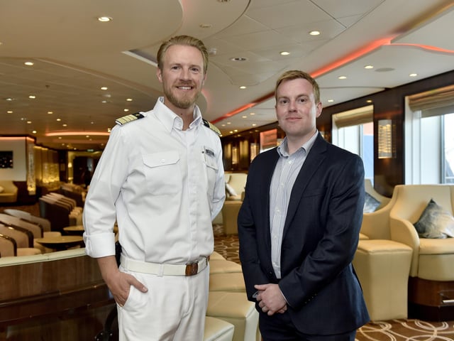 Pictured is: (l-r) Captain of Mein Schiff 3 Simon Böttger and Andrew Williamson, passenger operations manager (Portsmouth International Port).