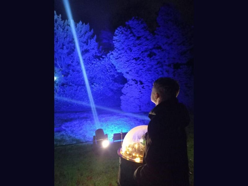 Visitors can control spotlights which are pointed up a the sky